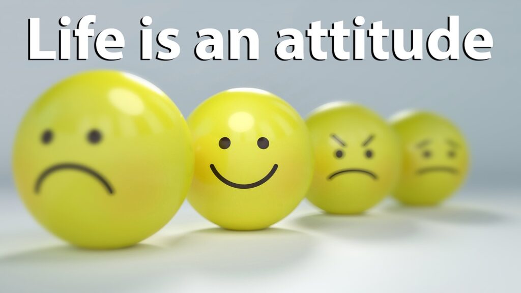 yellow attitude emoticons on gray background, text 'Life is an attitude.'