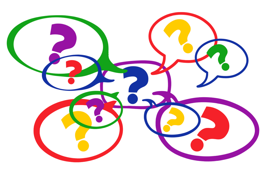 multiple questions marks, a variety of colors on white background