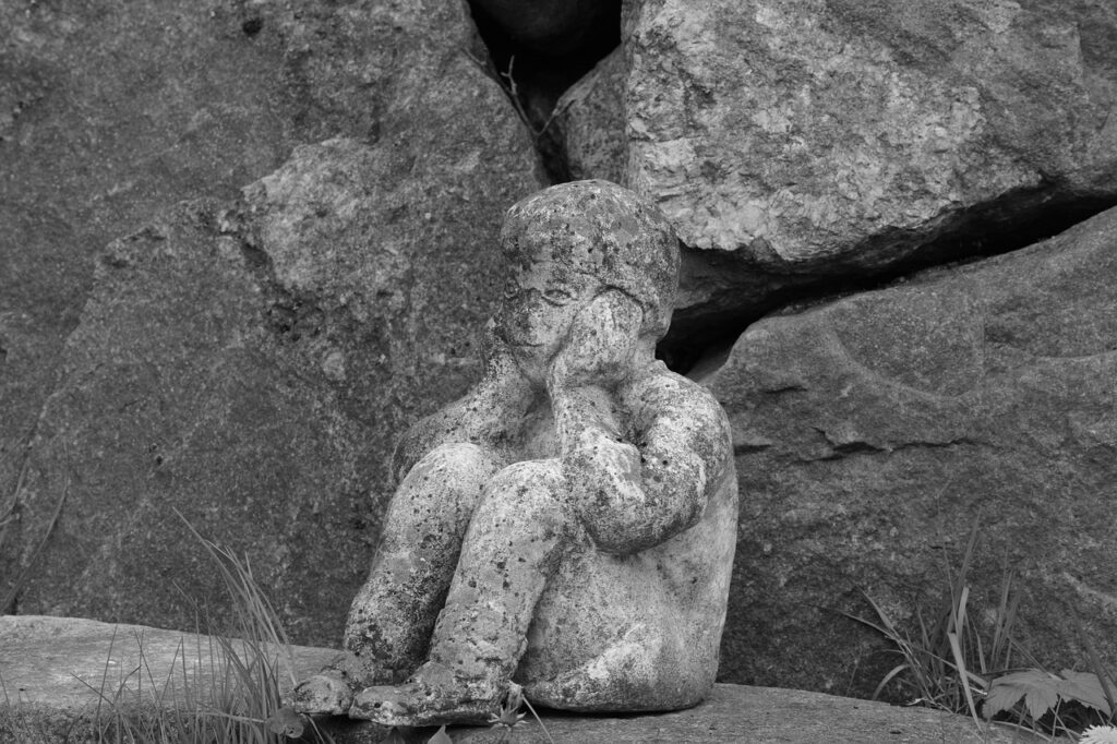 grieving cherub