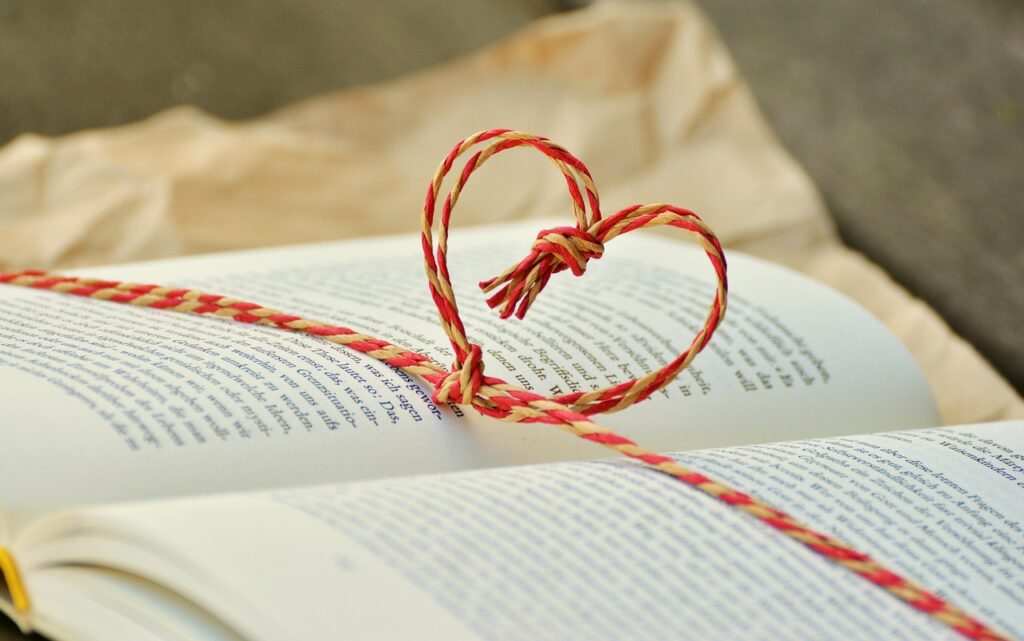 book with yarn heart