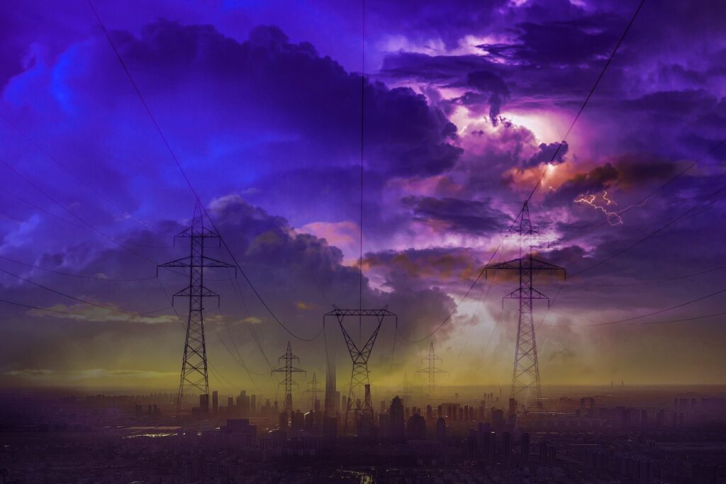 Purple and pink cloud cover over a city