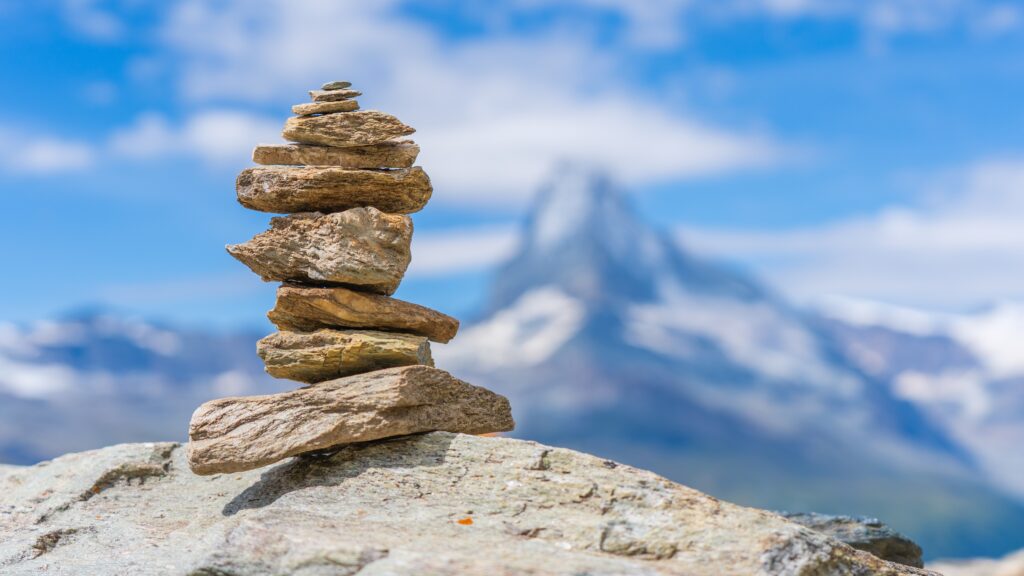 stones delicately balanced representing stability